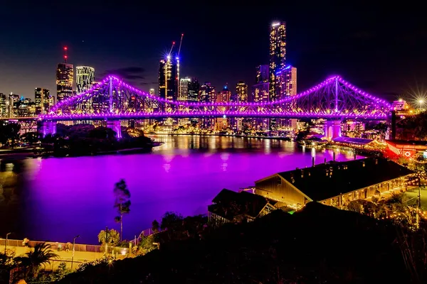 Immersive Light and Purple Bridges: Your Monday in Brisbane